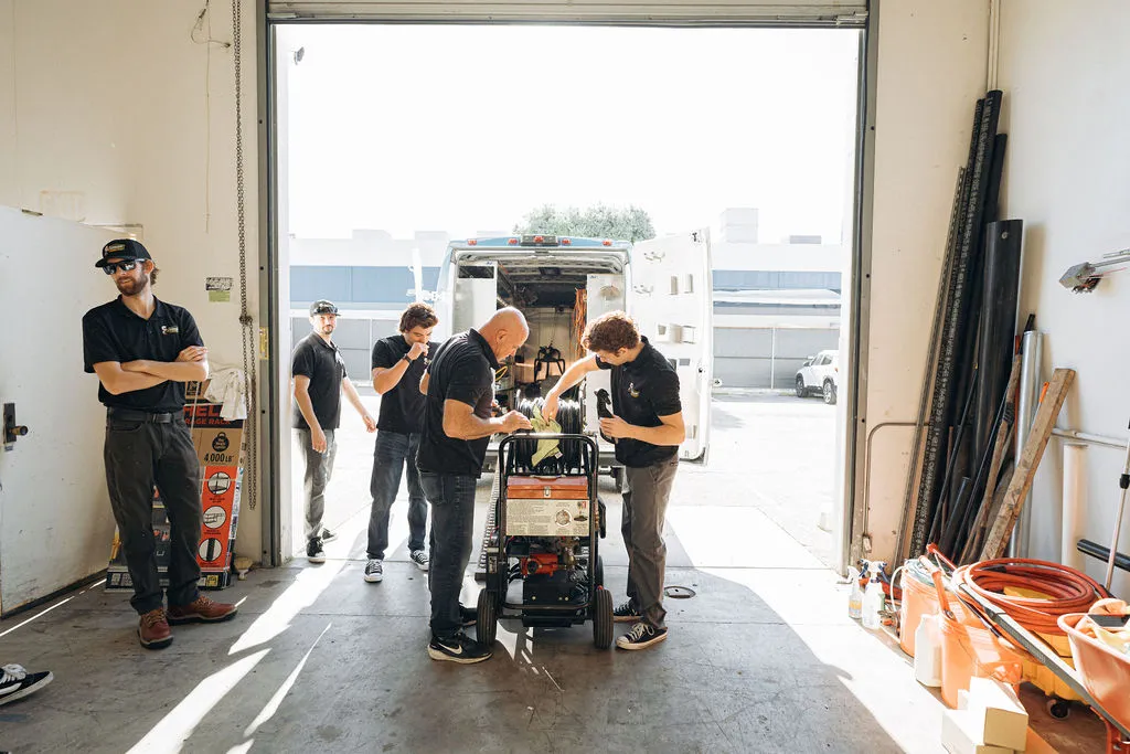 Wiseway crew loading service truck with plumbing equipment