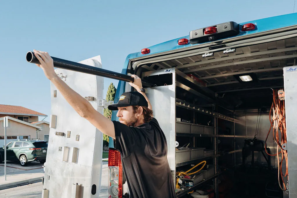 black pipe, branded truck