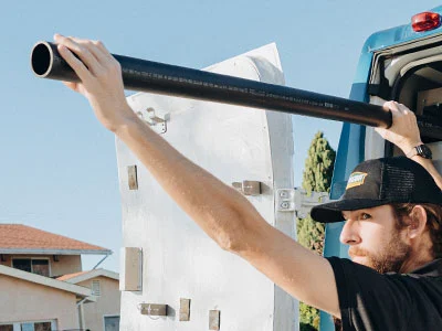 repiping - black pipe from truck